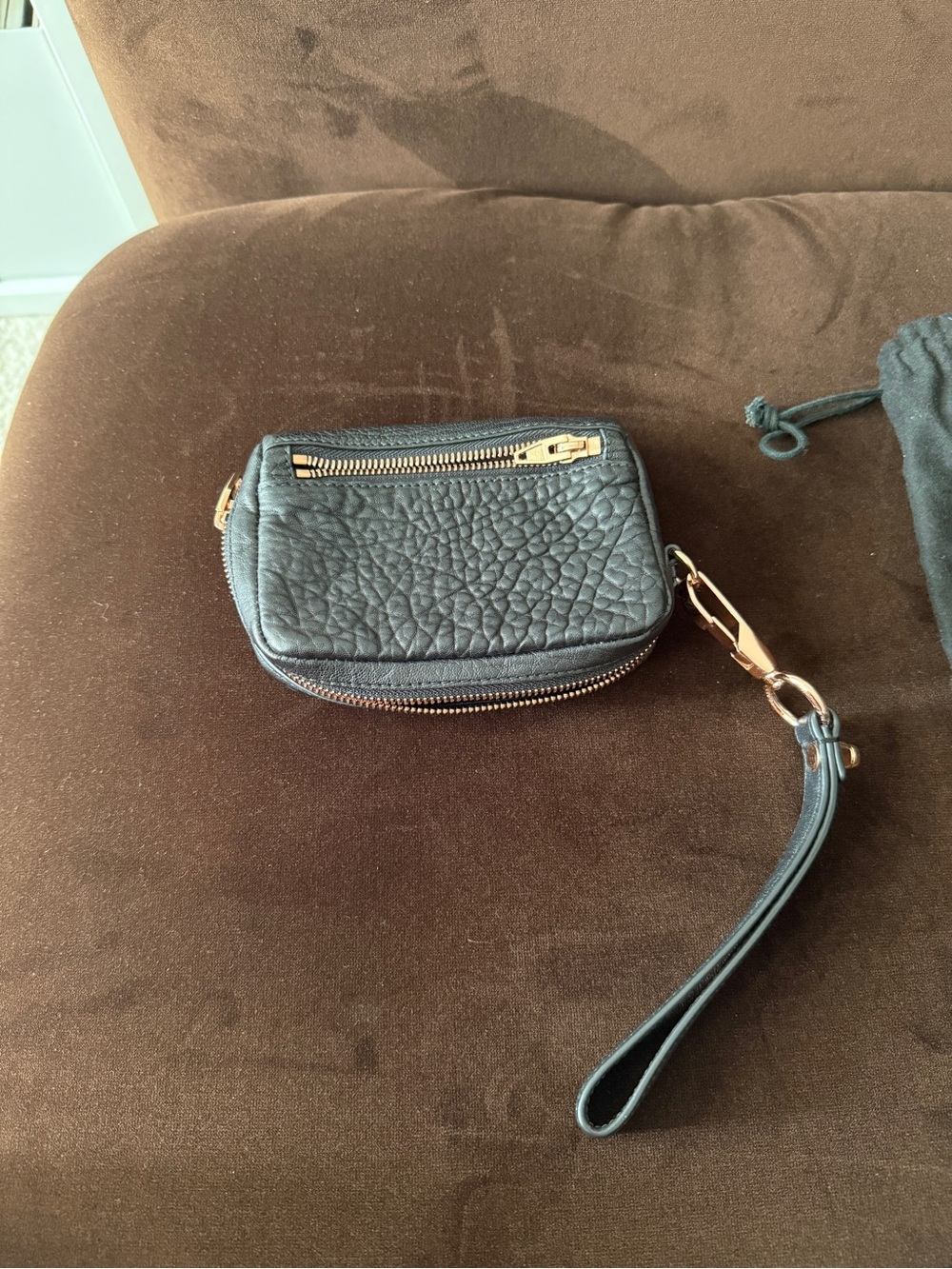 Alexander Wang pebbled fumo leather wristlet rose gold